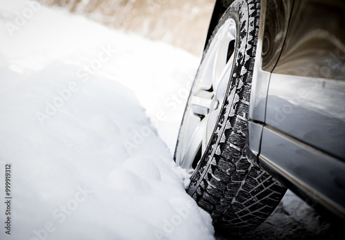 Driving car in winter with much snow photo