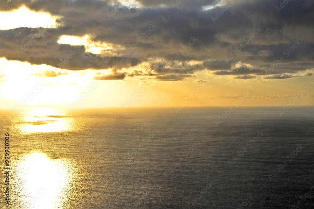 Golden sunset in the ocean waters Golden sunset in the ocean waters