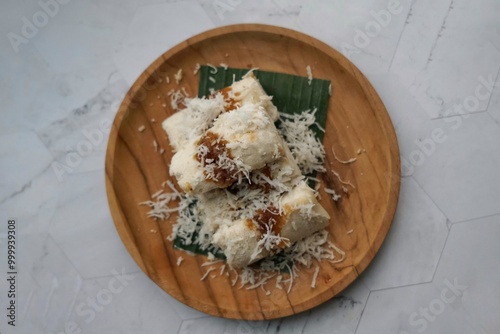 Putu Bambu or Rice Flour Steamed Cake in Bamboo.  A popular snack in Malaysia, Indonesia and Singapore. photo