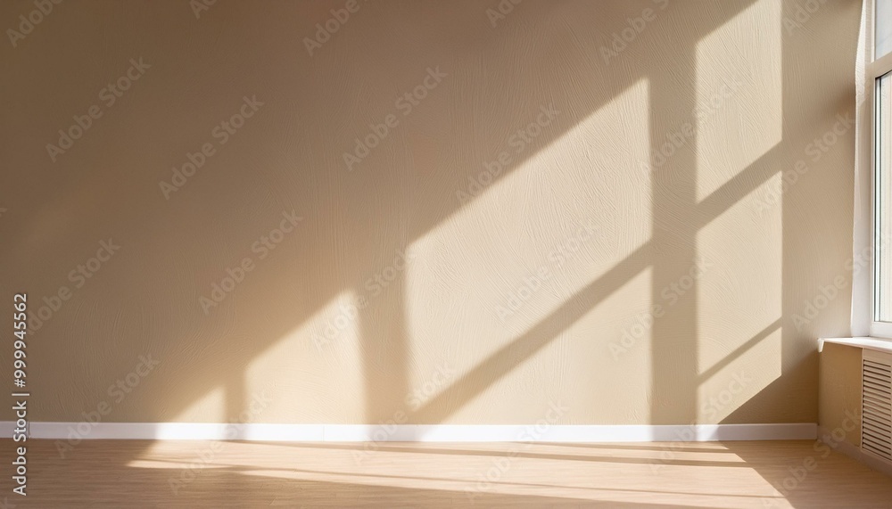 Light on the background wall. Shadow from the window and sunlight. White rays of the sun in a bright empty room. Shade overlay. Modern studio in beige tones. interior of a room with a window Light on the background wall. Shadow from the window and sunlight. White rays of the sun in a bright empty room. Shade overlay. Modern studio in beige tones. interior of a room with a window
