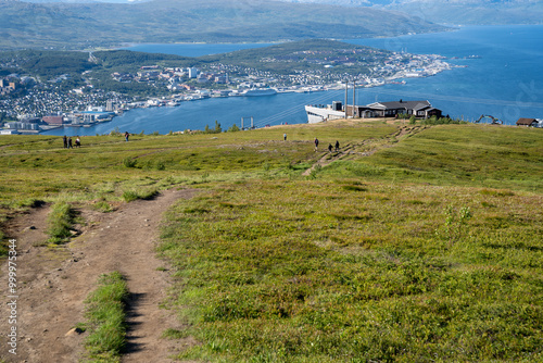 Tromso, Norway - 07.04.2024: Fjellheisen cable car station on Mount Storsteinen and view over Tromso, Norway from Storsteinen viewpoint