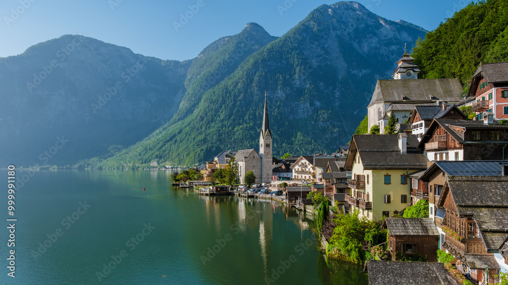 Exploring the serene beauty of Hallstatt Austria on a clear summer morning by the lake Exploring the serene beauty of Hallstatt Austria on a clear summer morning by the lake