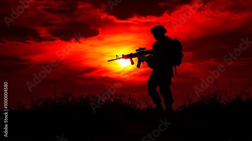 Silhouette of a soldier holding a rifle beneath a glowing red sky.