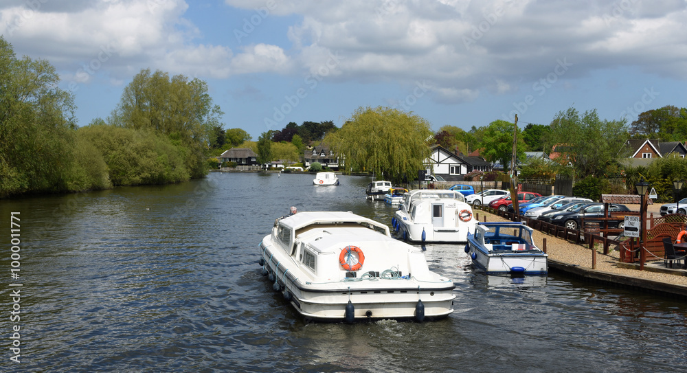 Naklejka premium Boards cruiser on the river Bure at Horning