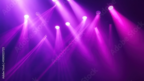 A vibrant display of purple stage lights illuminating a performance space.