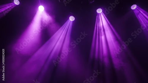 Purple stage lights illuminating a smoky atmosphere for an event or performance. photo