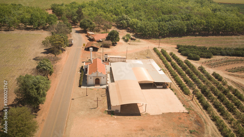 Drone view of Tres Barras rural neighborhood and Santa Cruz Chapel in Barretos, Sao Paulo, Brazil photo