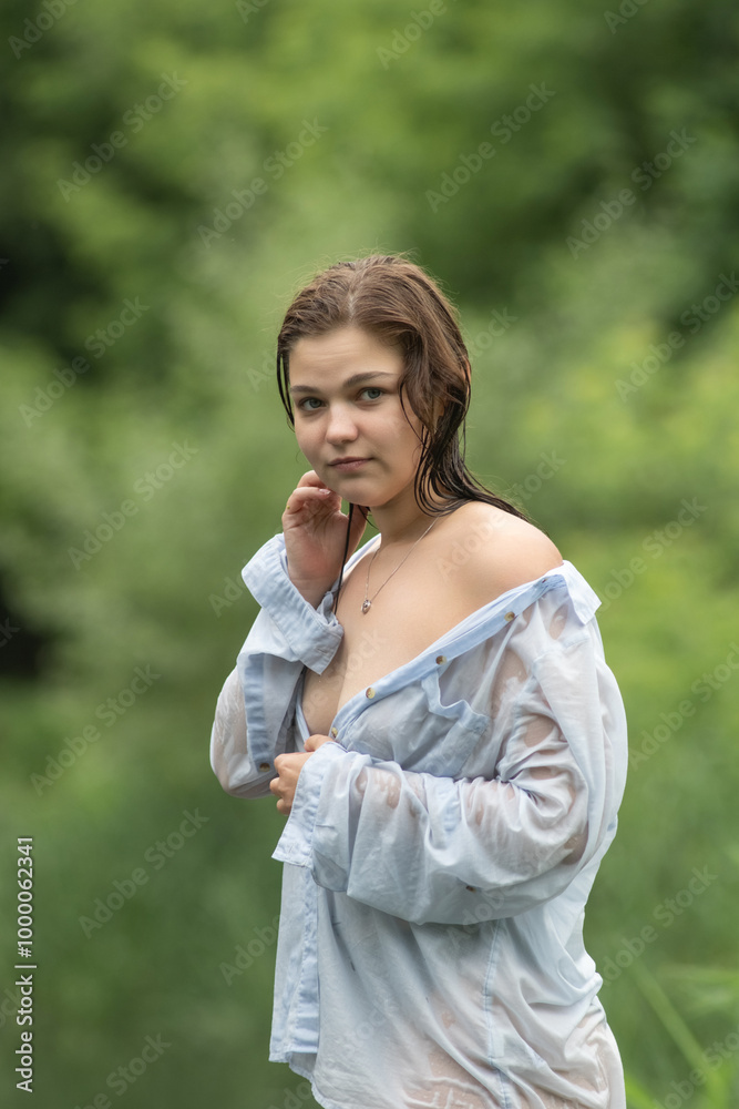 Beautiful young dark-haired girl by the river. Beautiful young dark-haired girl by the river.