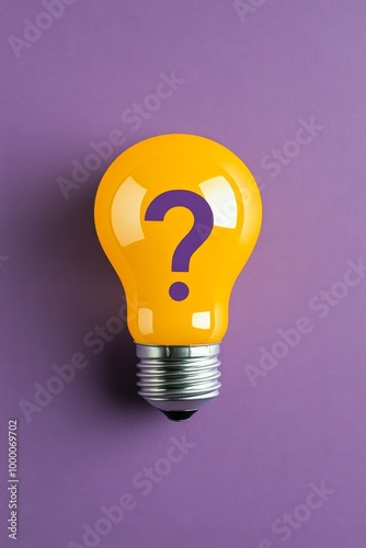 Yellow light bulb with question mark on purple background representing creati...