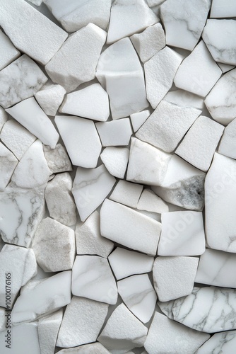 Decorative arrangement of white marble fragments showcasing natural patterns ...