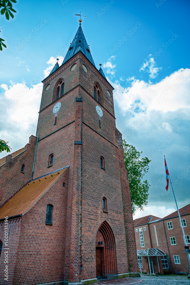 Obraz premium St. Nicholas' Church (Sankt Nicolai Kirke) is the oldest church in Kolding, with a history dating back to the 13th century.