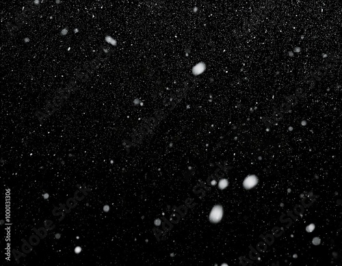 Snow on a black background for use as an overlay layer