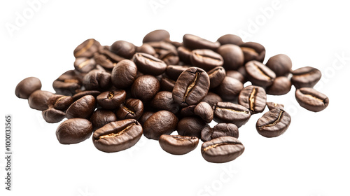 A handful of roasted coffee beans scattered across a white background