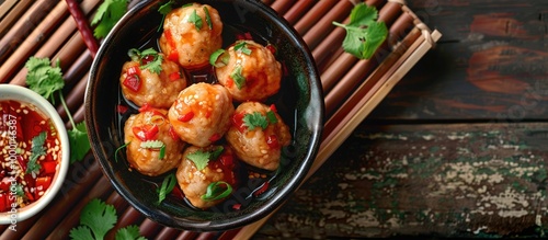 Food And Cuisine Asian Style Fish Meatballs Served With Spicy And Sour Sauce