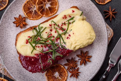 Delicious sweet brioche sandwich with raspberry jam and ricotta cream photo