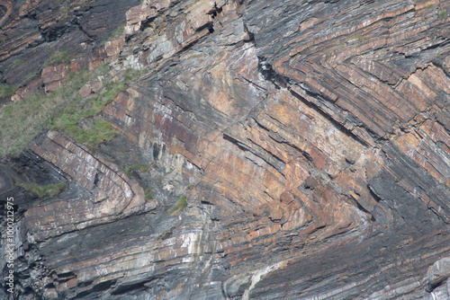 Folded strata at Millook Haven Cornwall photo