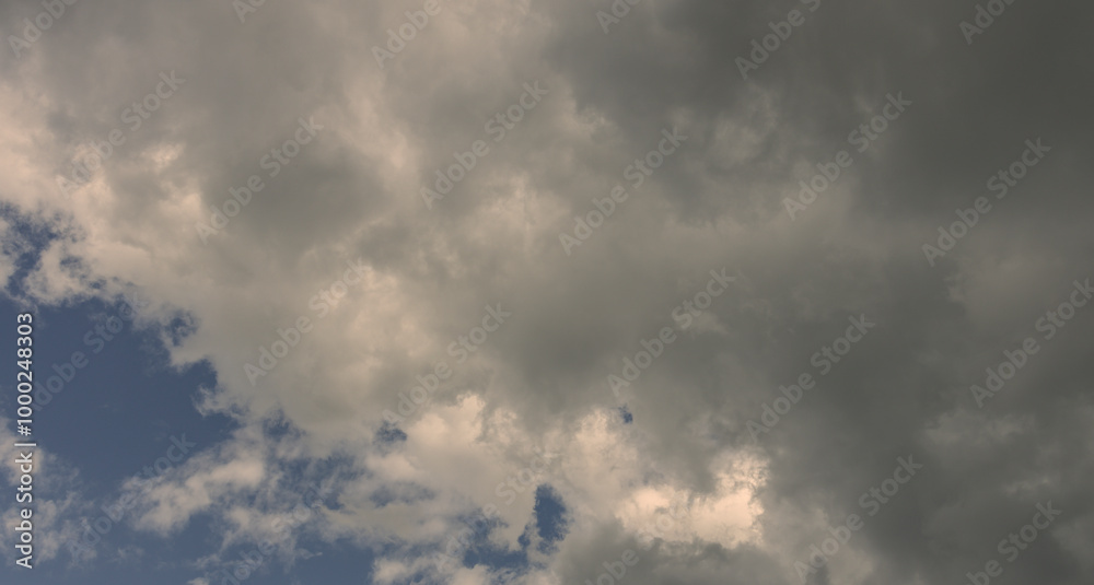 The sky is cloudy and the sun is barely visible The sky is cloudy and the sun is barely visible
