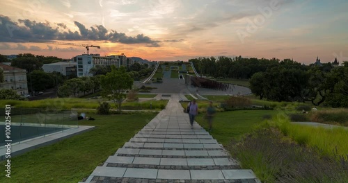 Budapest, Hungary - July 19, 2024: Sunset landscape view of the Museum of Ethnography. Time-lapse. photo