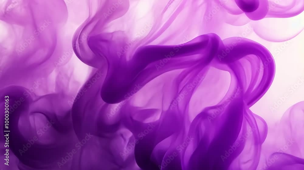 Purple ink swirls and dances in a clear liquid, creating a beautiful abstract pattern Purple ink swirls and dances in a clear liquid, creating a beautiful abstract pattern