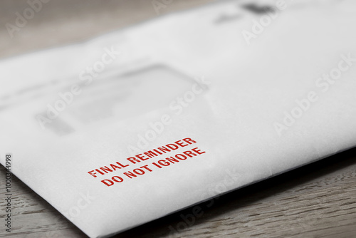 Final reminder do not ignore letter stamped in red on an envelope. Cost of living debt concept photo