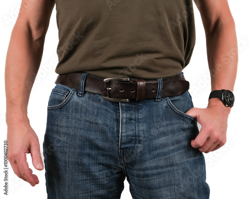 фотографія The handsome man wear blue jeans and brown genuine leather belt.