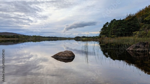 Obraz na płótnie Beautiful lakeside landscape scenery with mirror reflection in Ross lake at Rosccahill, Galway, Ireland w salonie