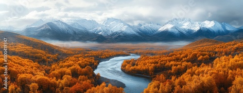 Snow-Capped Mountains with a Serene River Flowing Through Vibrant Autumn Forest
