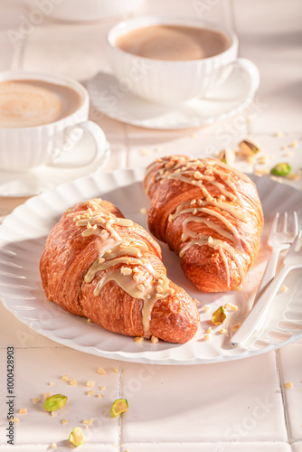 Delicious and sticky pistachio croissants ready to eat.