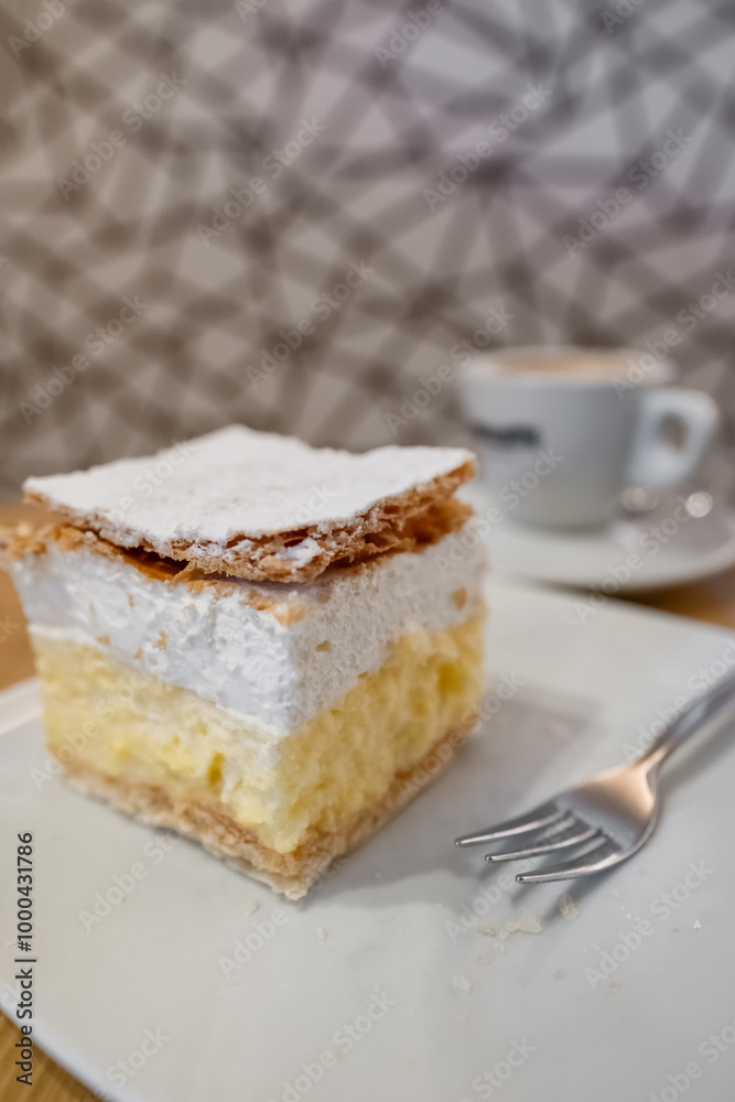 Local vanilla custard cake or Kremna Rezina served at a cafe in Bled