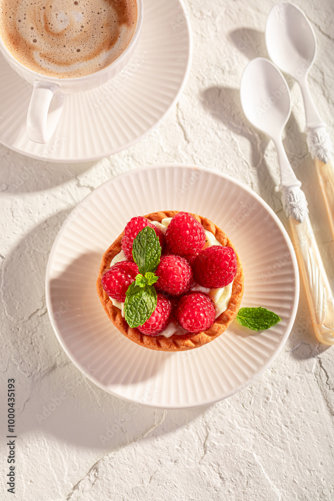 Homemade mini tart made of raspberries and local ingredients.