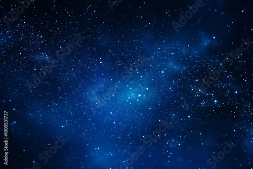 Dark blue night sky with glowing stars, a starry backdrop representing the universe and space, capturing the beauty of a blue, glowing expanse in a serene night scene.