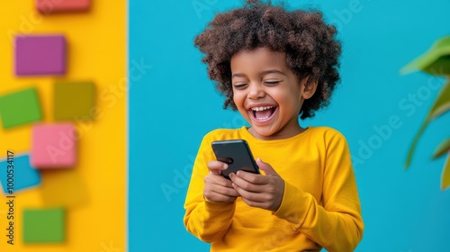Happy Kid Using Smartphone  Smiling  Playing Games  Blue and Yellow Background