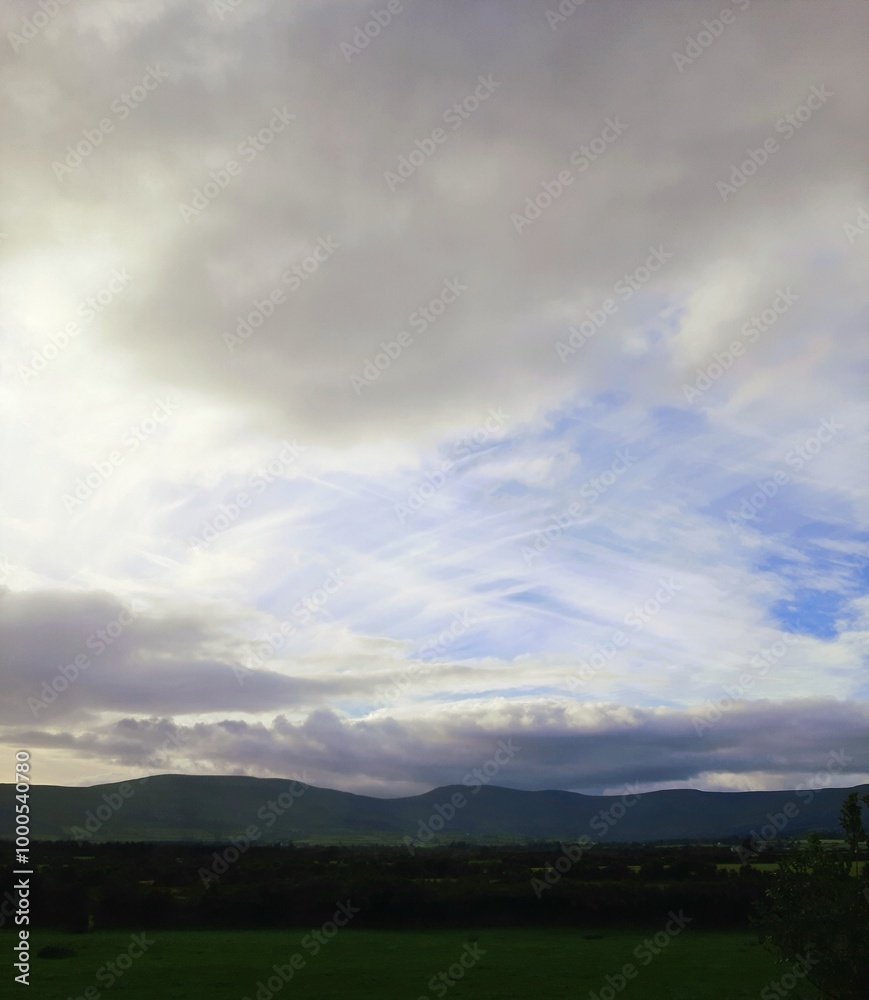 Obraz premium clouds over the hills