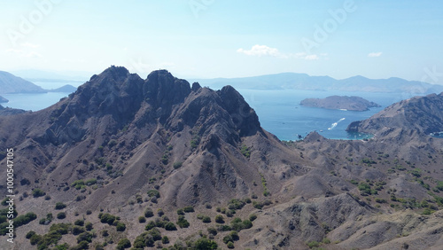 Komodo National Park, Padar Island with the famous pink beach. Aerial view of the mountainous landscape near the coast, drone view