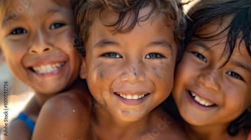 A heartwarming close-up of three smiling kids with diverse skin tones, faces close together