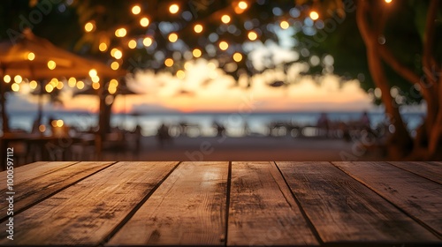 3. A weathered wooden table featuring a casual setup, with a blurred beach cafe and sparkling bokeh lights in the background, perfect for capturing a summer evening ambiance