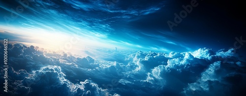 A breathtaking view of dramatic clouds illuminated by soft sunlight, showcasing a mesmerizing blend of blue and white tones.