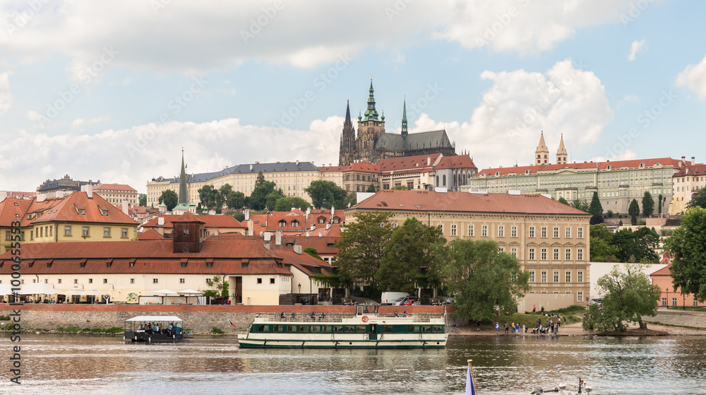 Obraz premium View from opposite bank of Vltava to St Vitus Cathedral and Nova Strana district of Prague in Czech Republic