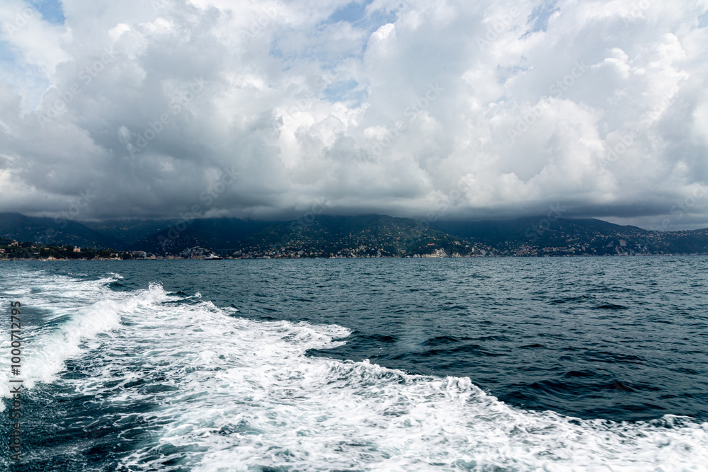 Waves and foam behind a ship
