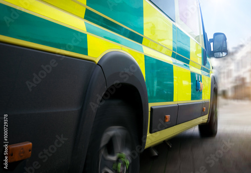 Ambulance - emergency services ambulance vehicles travelling to scene.  The medically equipped transport rushed patients with paramedics to a health care facility, such as a hospital, for treatment.