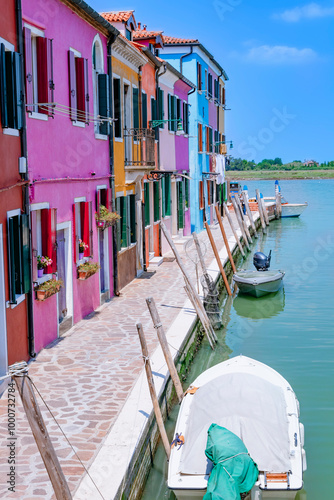 Obraz na płótnie June 25, 2019. Italy. Burano. Famous for its colorful canal with charming houses and vibrant boats w salonie