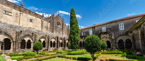 Impressive cloister with stone columns and arches in the cathedral of Santa Maria, Tui, Galicia.