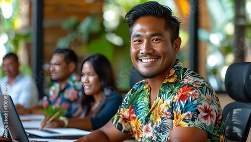 Smiling Man in Hawaiian Shirt at Meeting Table photo