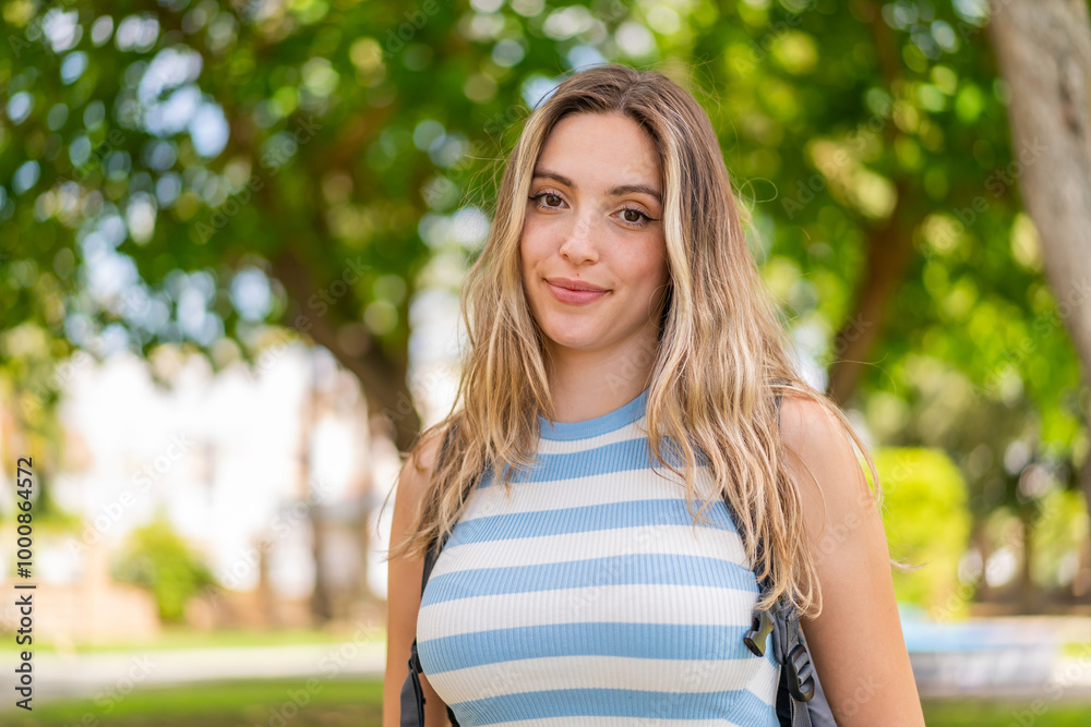 Young pretty woman at outdoors . Portrait Young pretty woman at outdoors . Portrait