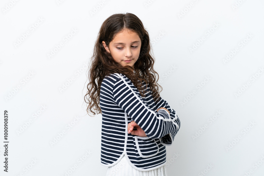 Little caucasian girl isolated on white background keeping the arms crossed Little caucasian girl isolated on white background keeping the arms crossed