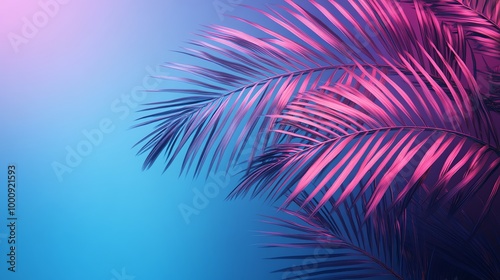 Palm leaves in pink and blue neon lighting.