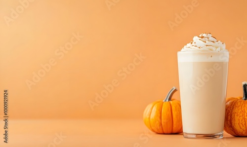 a glass of latte with big pumpkins and cut punpkins , Generative AI  photo