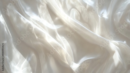 White sheer fabric with wrinkles in the material, sunlit.