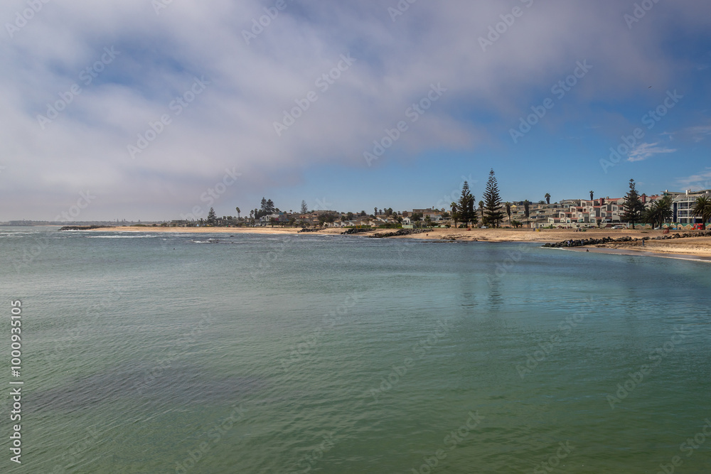 Naklejka premium Exposure of the The Swakopmund Jetty Pier, view of the harbour and The Swakopmund beach.
