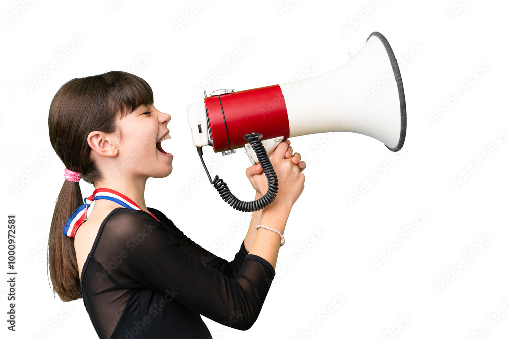 Little caucasian girl with medals over isolated background shouting through a megaphone Little caucasian girl with medals over isolated background shouting through a megaphone